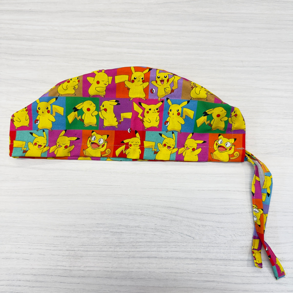 Cuffietta Pikachu a Quadri